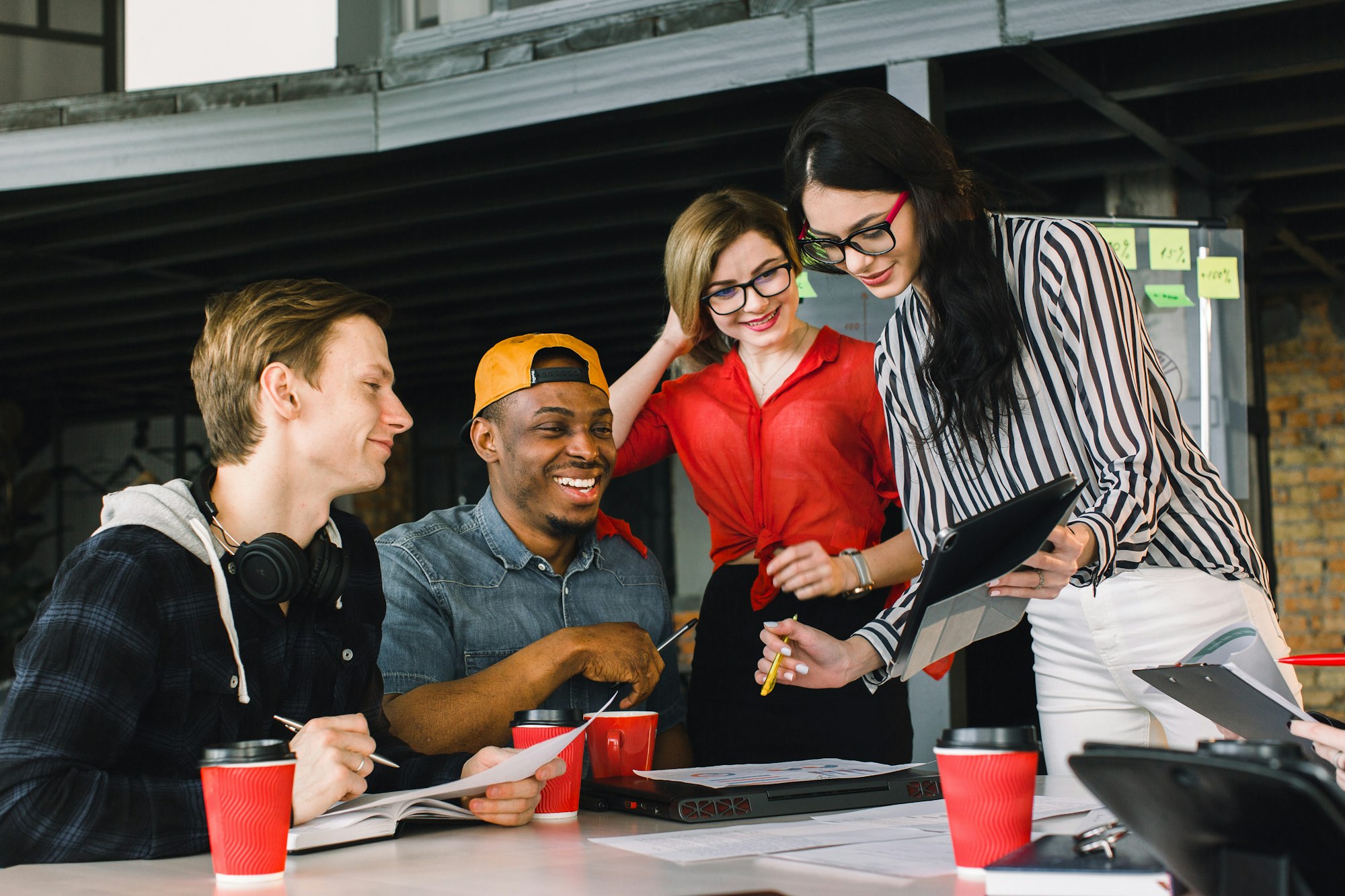 multiracial young creative people in modern office. Group of young business people are working